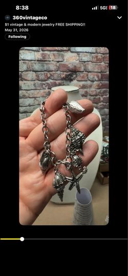 Silver tone Sea Shells Charm bracelet