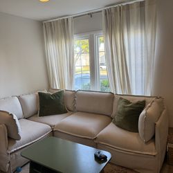 Cream sectional couch (dimensions in caption)