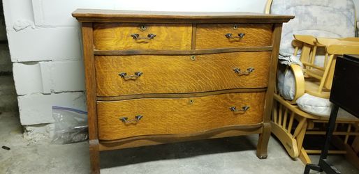 Antique low dresser with wave front