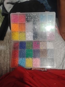 2 Containers Of Beads 
