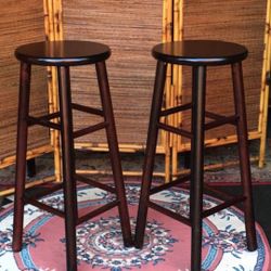 2 Bar Stools 30"H - Solid wood , Excellent condition Burgundy color -13" diameter x 30"Height 