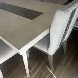 Dining table with four chairs