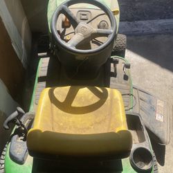 John Deere S100 riding lawn mower