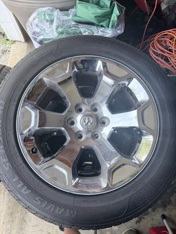 Ram Chrome Wheel with Mavis 275/55R20 Tire