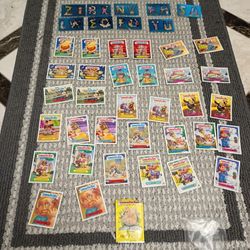 Lot of 46 series 5 garbage pail kids stickers & magnets 