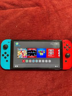 Nintendo Switch OLED 64gb w/ games