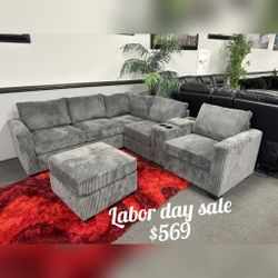Gray corduroy sectional sofa with ottoman with console