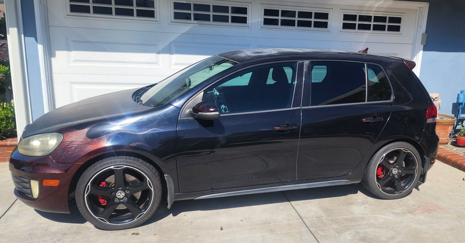 2010 VW GTI Black With Custom Paint Candy Red Paint On Fenders, Mirrors, Door Handles, Antenna Cover, Rear Spoiler, Engine Covers. Fuse Box Cover, Tur