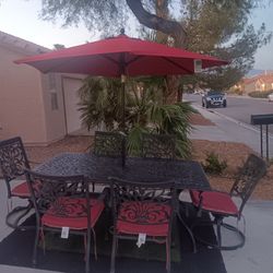 Patio Set Table And 6 Chairs With New Cushions And New Umbrela 