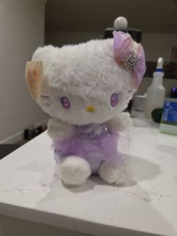 Purple Hello Kitty like Cat plushie