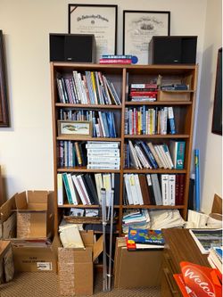 Two large wooden book shelves