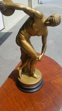 Roman statue gold leaf.