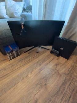 PlayStation 4 Pro Bundle with Monitor and Games
