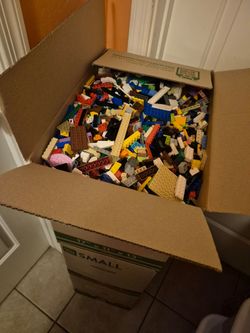 Four boxes of mixed Lego