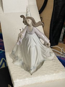 Lladro piece. Cinderella’s Fairy Godmother.
