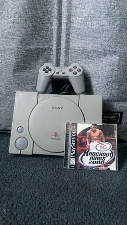 PlayStation 1 Console with Controller and Game
