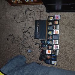 ATARI OVER 20 GAMES AND CONSOLE  