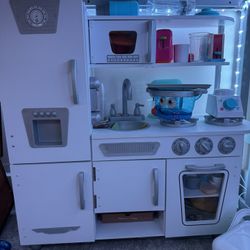 Fully loaded play kitchen 