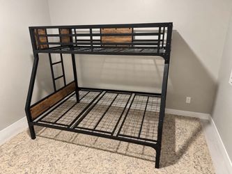 Twin over full black metal platform bunk beds.
