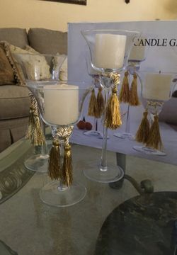 Set of 3 candle holders and two small candles
