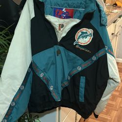 vintage 1990s Miami Dolphins NFL Pro Line puffer jacket