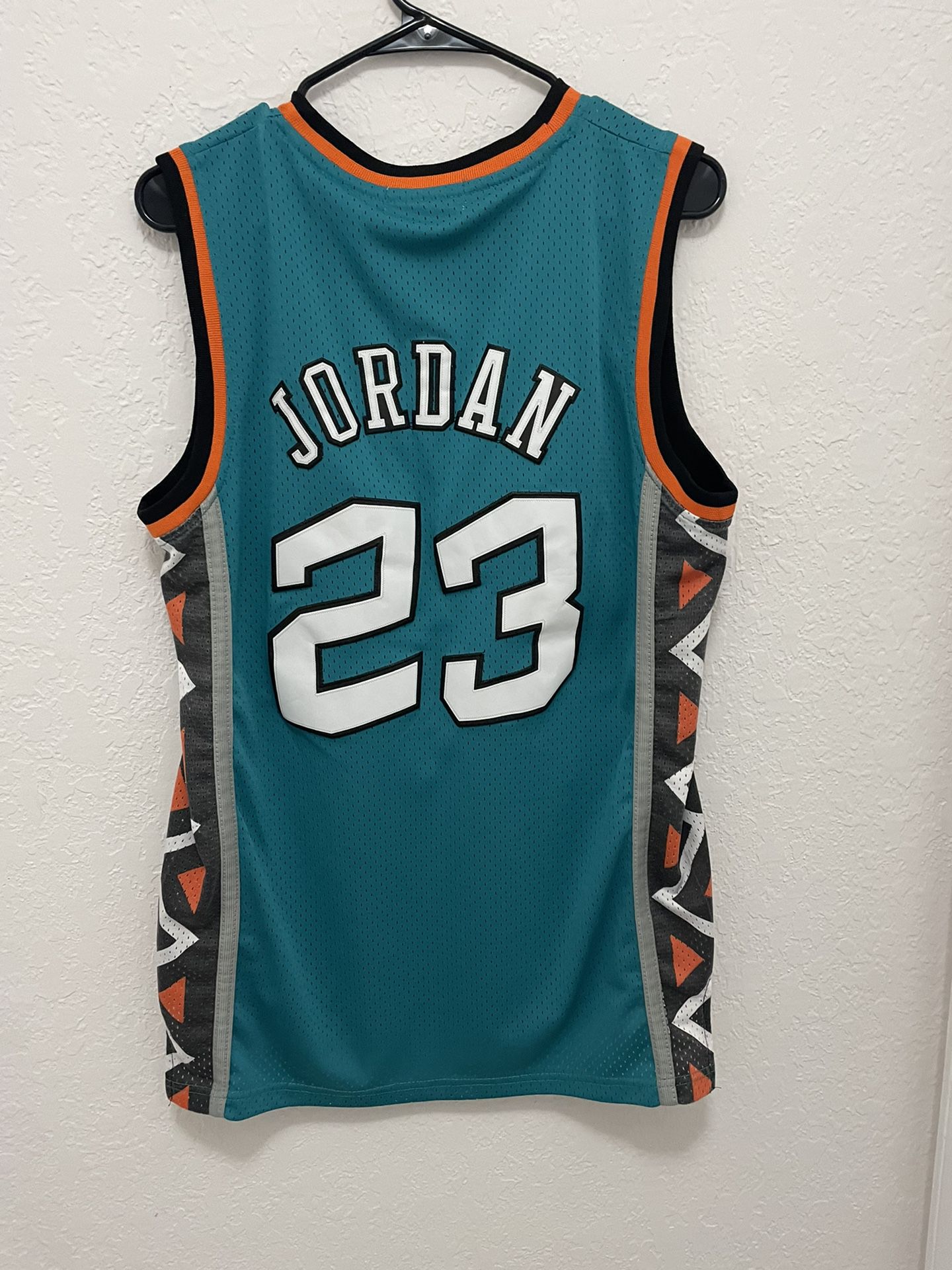 The Mitchell & Ness Michael Jordan Authentic Gold Jersey 