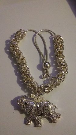 Heavy Silver metal bracelet with Elephant charm.