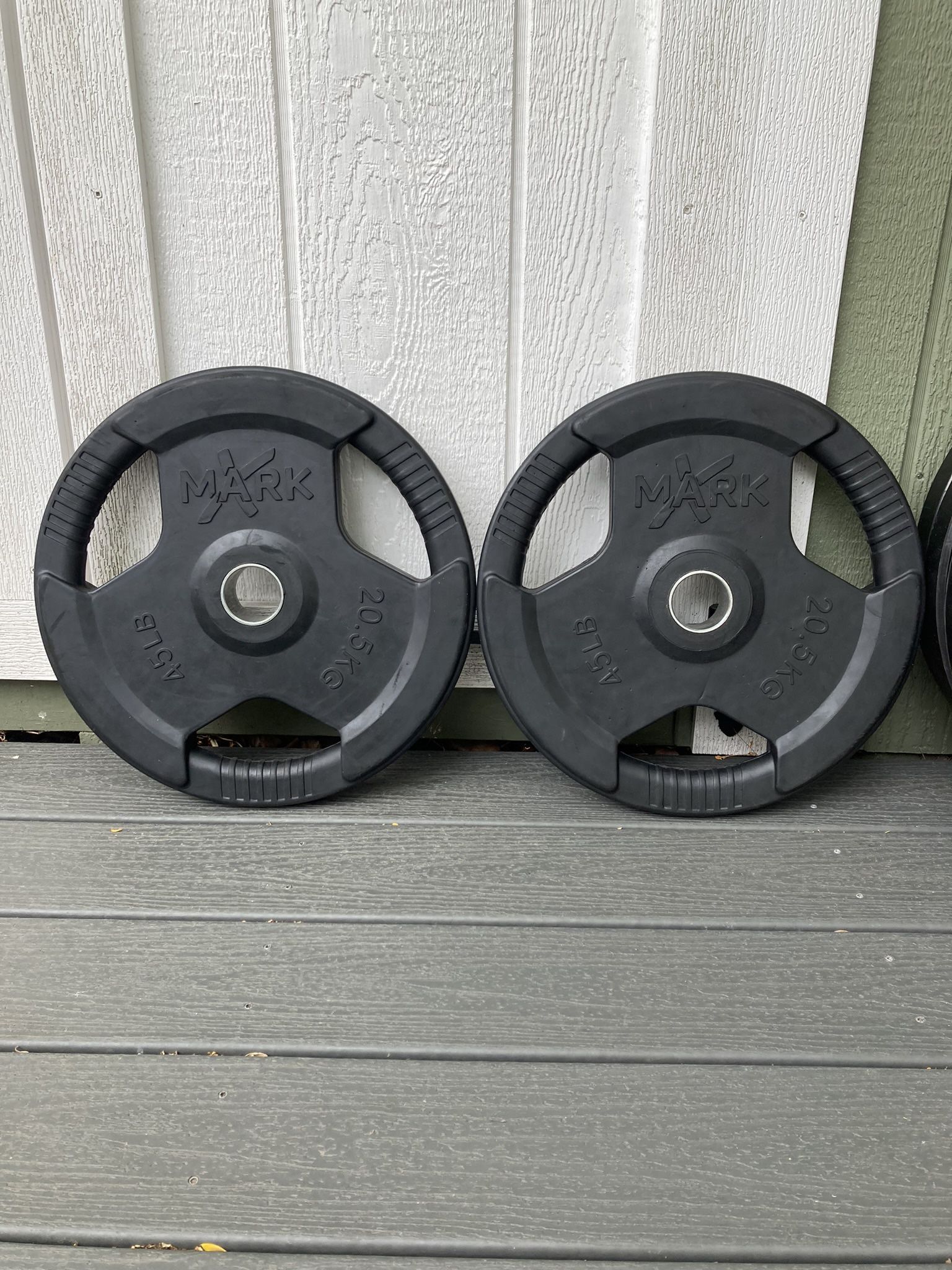XMARK 45 Lb Olympic Rubber Encased Steel Weight Plates