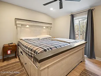 Bob's Beaumont King Storage Bed + Matching 5-Drawer Chest