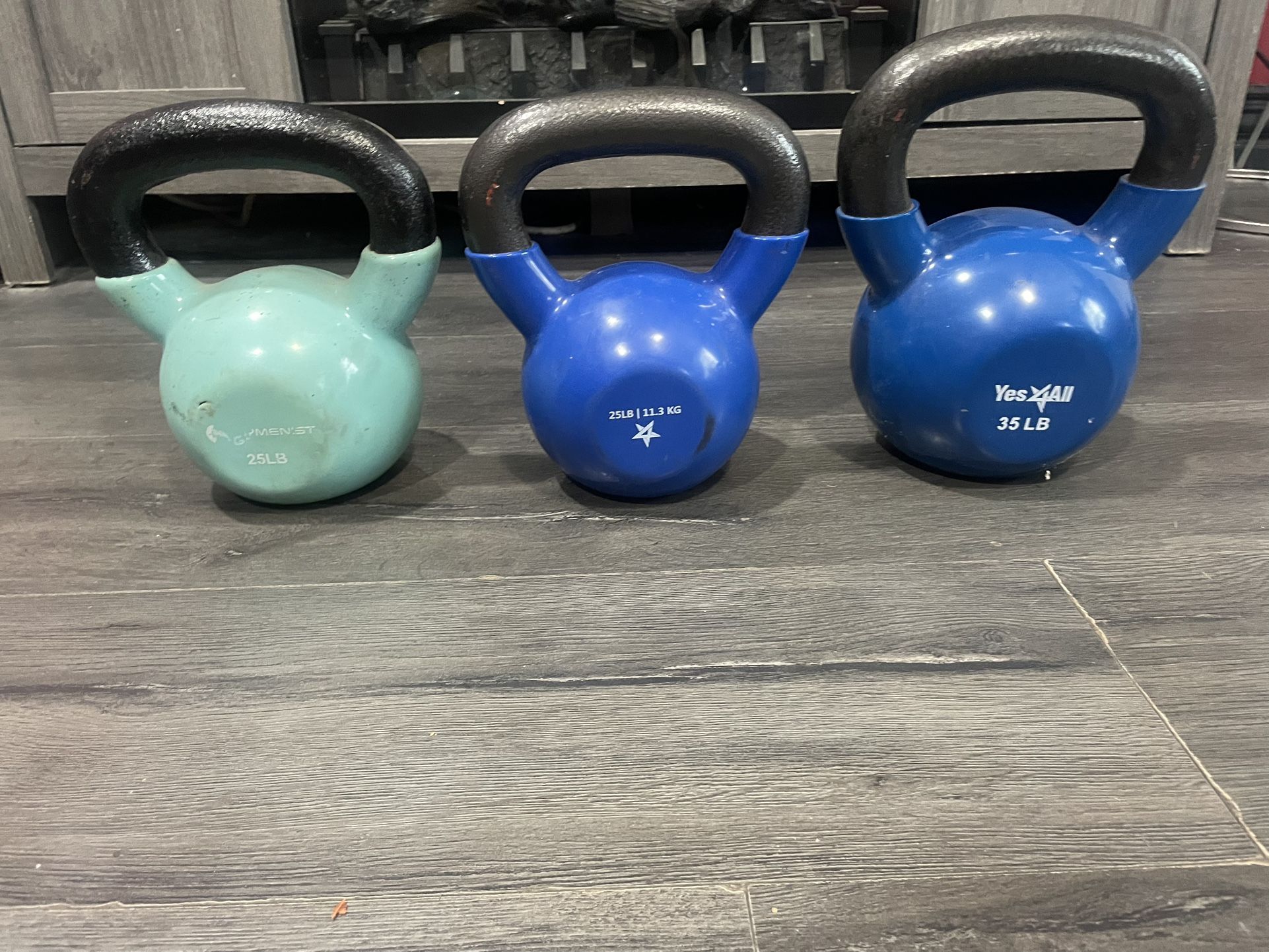 Workout set of kettleball, with a set of 25lb, and a individual one of 35lb, all for $75 For Everything