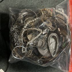 Gallon Ziplock Bag Full With Junk Jewelry 