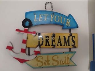 Giant metal beach themed sign