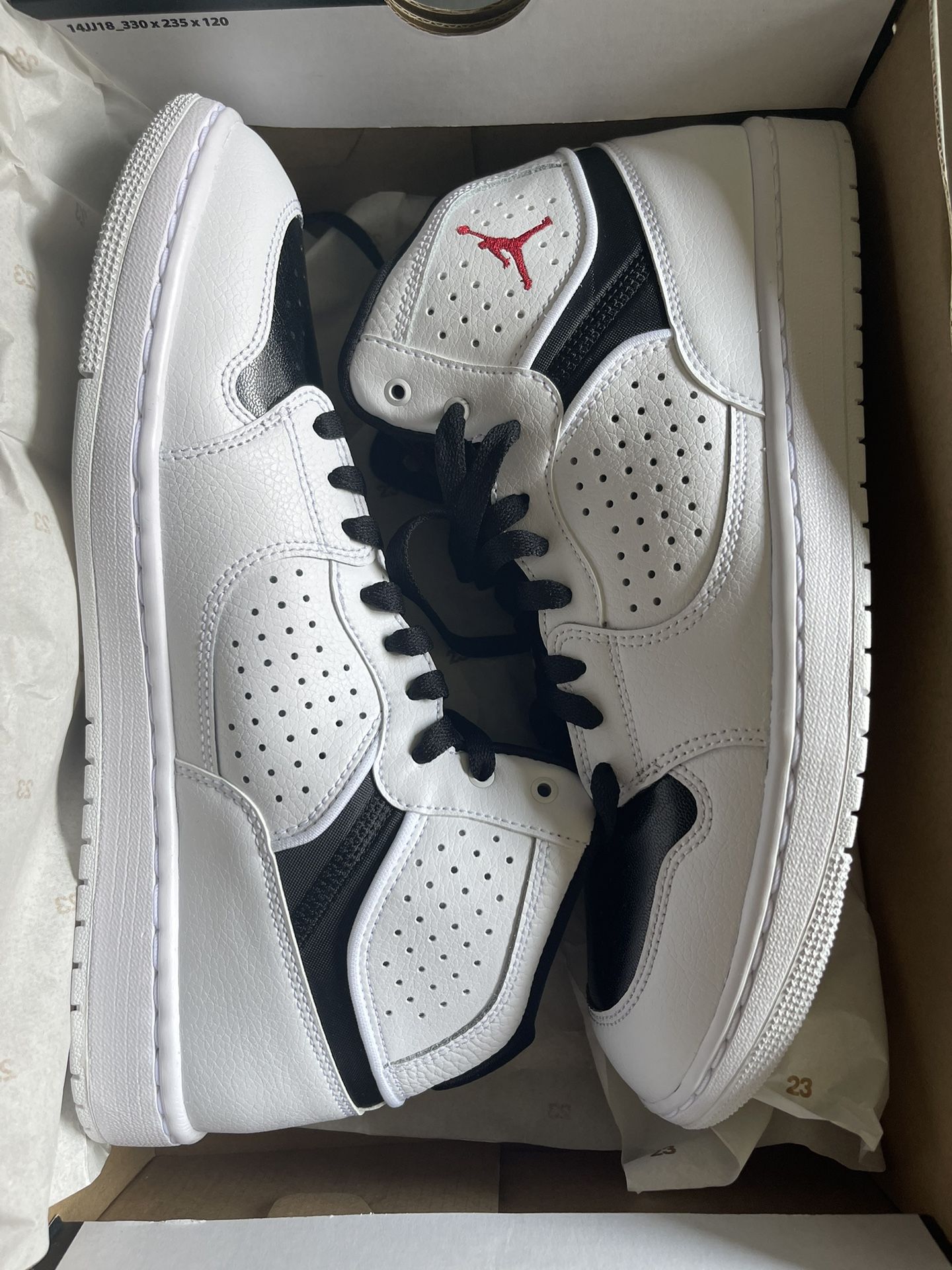 Air Jordan White and Black Mans Sneakers. New. Original price $190 size 10,5