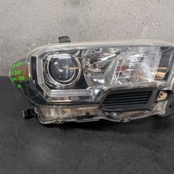 2016-2017-2018-2019-2020-2021-2022-2023 TOYOTA TACOMA RIGHT HEADLIGHT BLACK VESSEL OEM USED #9919