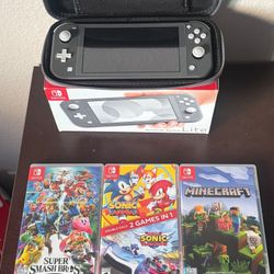 Nintendo Switch Lite + Games