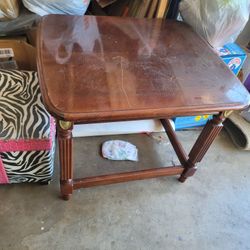 Wooden Table With Gold Accents