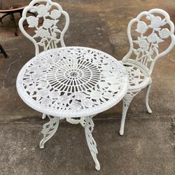 Cast Iron table and chairs 