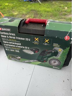 cordless grass shear and shrub trimmer, packaged as a bare tool without a battery or https://offerup.com/redirect/?o=Y2hhcmdlci5JdA== features a 2-in-