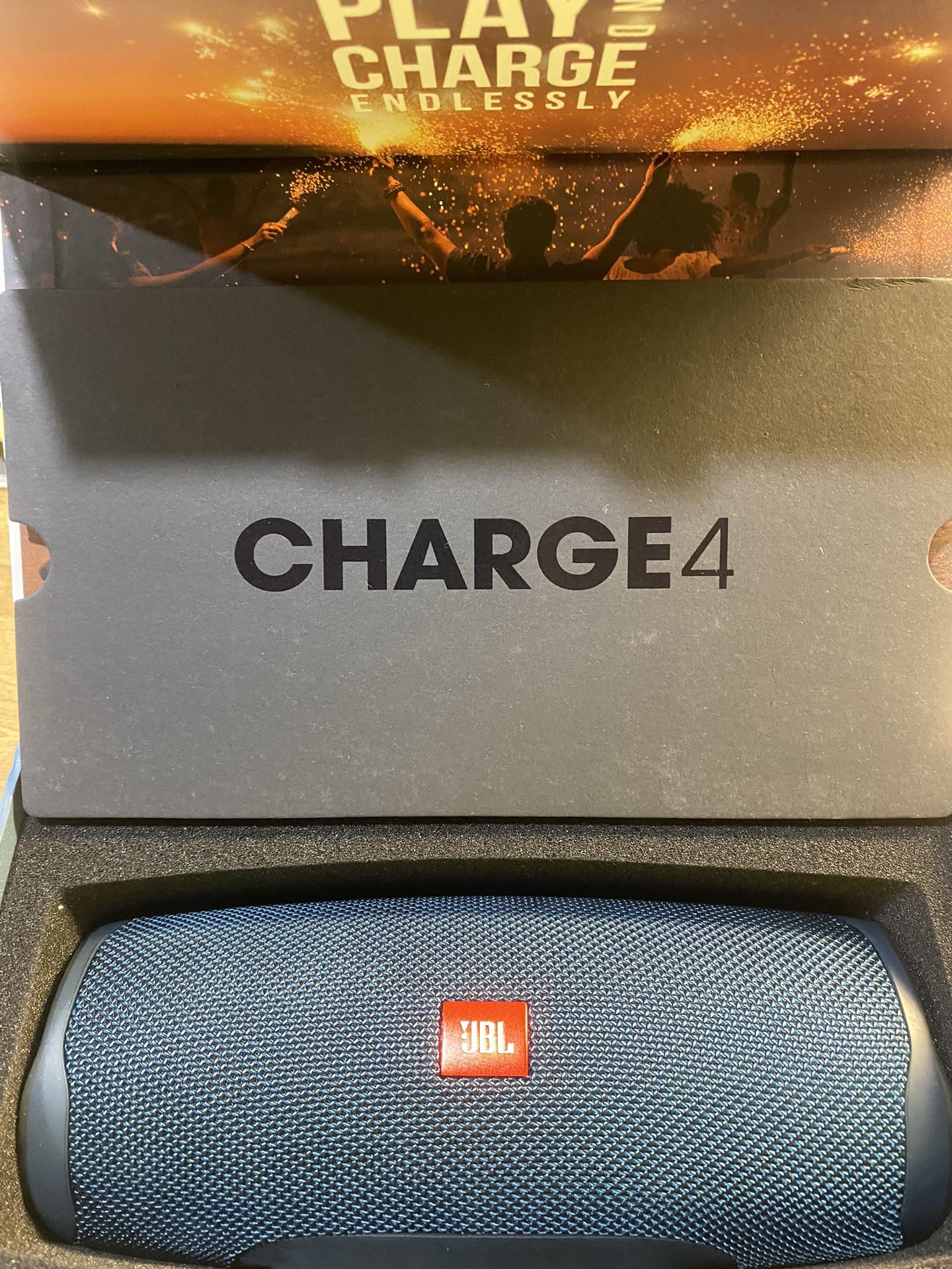 THIS IS A NEW JBL BY HARMON CHARGE 4 IN BLUE