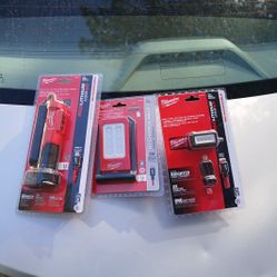 2 Milwaukee Work lights.  one , milwaukee , headlamp , lamp . All Three Are brand new still in the package never been used.