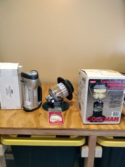 Four Coleman Propane and Battery Lanterns