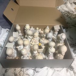 Precious moments clay sculptures