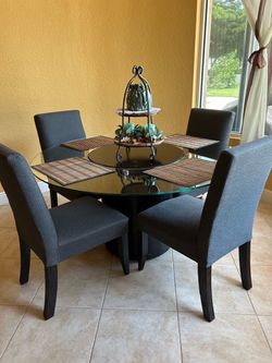 Round Dining table with 4 chairs includes lazy susan