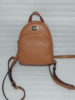 Michael Kors Designer backpack book bag converts to crossbody bag. Authentic. Brown Leather. Like new. Beautiful Women's Handbag small purse