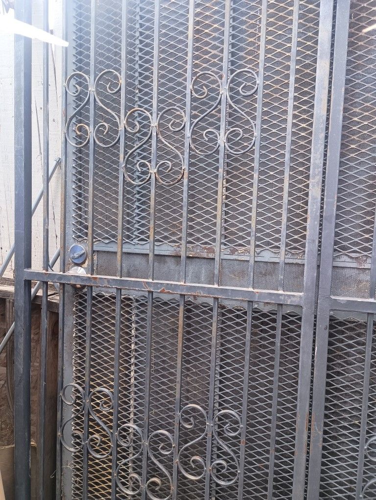 Metal. Gates And. Wood. Barrier
