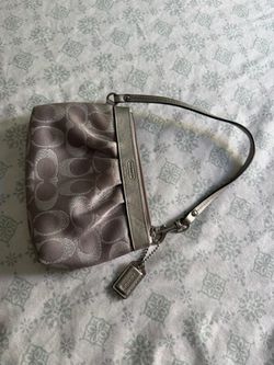 Coach silver whistle bag