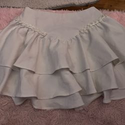 White Skirt With Pearls Hanging