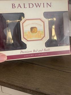 New Baldwin premium Bed And Bath brass wave handles