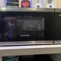 Silver & Black Proctor Silex 1.1 cu ft 