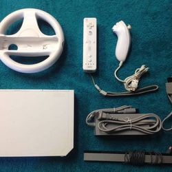 NINTENDO WII + 33 POPULAR WII GAMES MARIO KART,MARIO PARTY,ZELDA,WII SPORTS and Many More